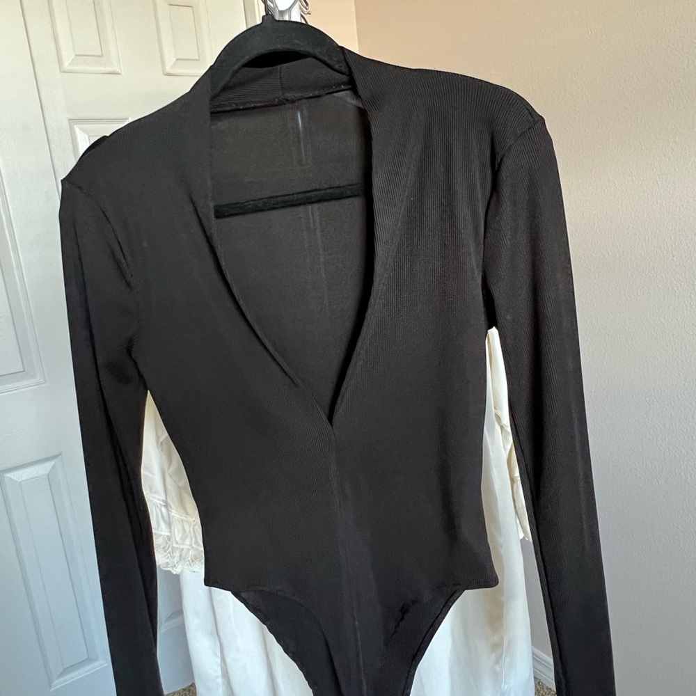 Black long sleeve low cut body suit